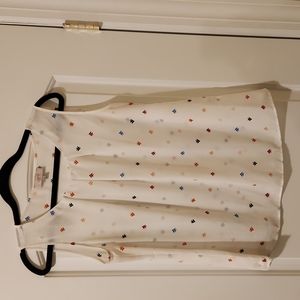 White sleeveless printed blouse